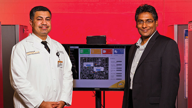 Salman Ahmad, MD, and Prasad Calyam, PhD, receive their Coulter award.