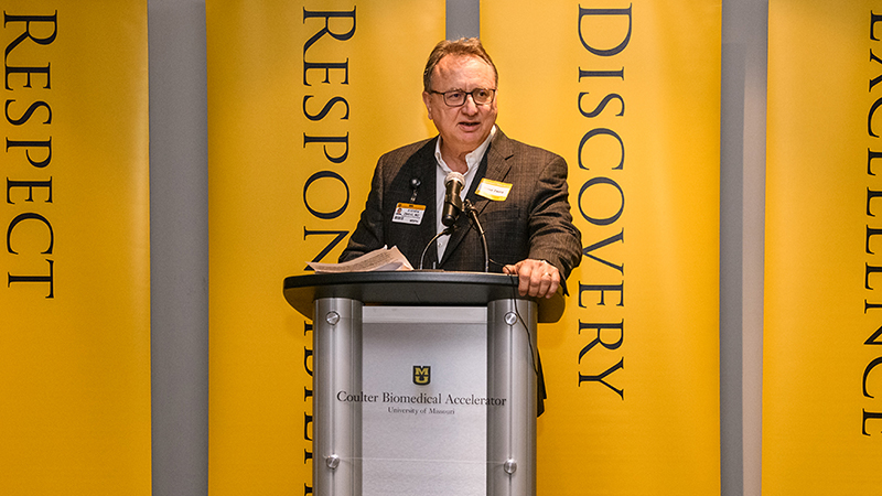 Dr. Zweig presenting at the Coulter Awards 2019