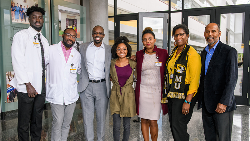 Dale Okorodudu, MD ’10, third from left, is joined by MU medical students
