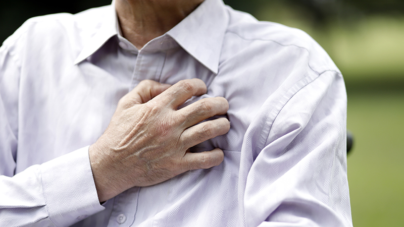 man having chest pain