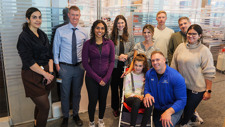 John Ruth poses with research team