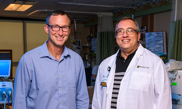 Dr. Fales, PhD and Dr. Pardalos, MD