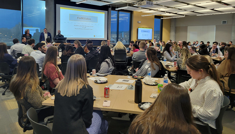 The flat-floor classroom of the Patient-Centered Care Learning Center was packed with students and researchers. ForMULation was an excellent opportunity to share research opportunities in a relaxed environment.