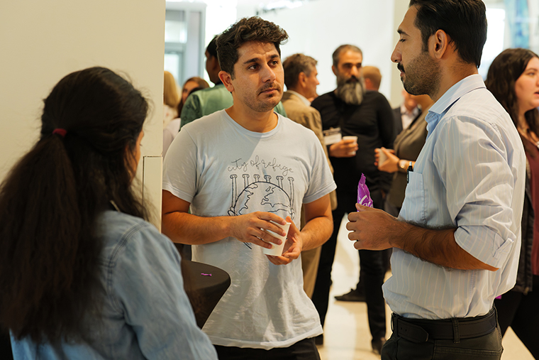 Students took advantage of the opportunity to mingle with the panelists and other guests from the biotech industry. Free professional headshots were available, too.