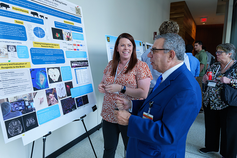  Caption: I had a fascinating talk with Addison Byrne, an animal science researcher. Her poster focused on the viability of using pigs as models in translational research.