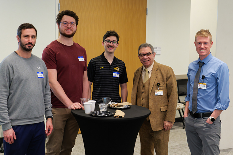 Rick Barohn, MD visits with postdoctoral trainees.