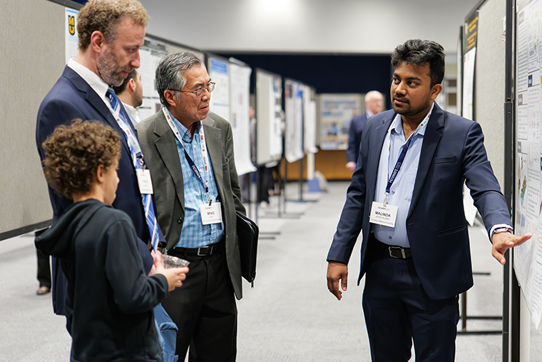 MU postdoctoral graduate Malinda Jaythilake, shares his research findings during one of the Pathways 2025 poster sessions.