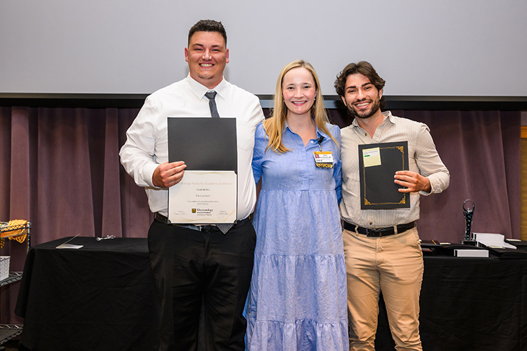 Travis Jackson and Kostandin Valle are presented the Department of Dermatology “Award for Academic Excellence.”