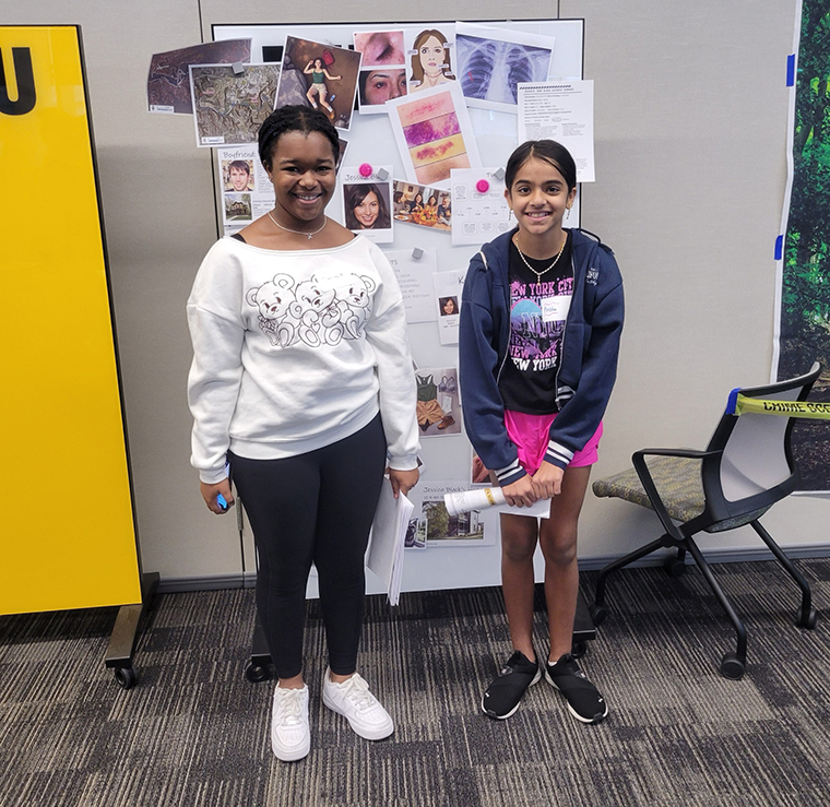 Camryn Emanuel (left) and Prisha Yadav (right) participated in the first-ever CALEB Science Club crime scene investigation event.