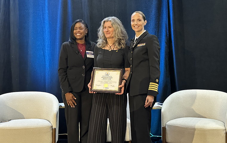 Dr. Becevic accepts the HRSA Telehealth Innovation Award.
