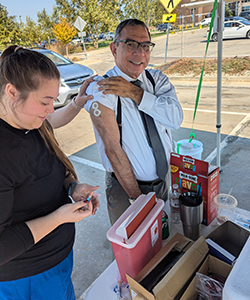 In this photo, MU School of Medicine student Mattaline Killingsworth prepares to administer my vaccinations at the Oct. 12, 2024 drive-thru vaccination event at South Providence Medical Park in Columbia.