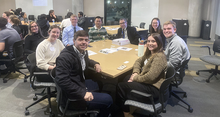 It was a pleasure to attend ForMUlation. I am seen here enjoying a meal with our medical students and Dr. Dave Arnold, executive director of the NextGen Precision Health initiative; Dr. Carmen Cirstea, chair of the event; and Dr. Shaoping Hou.