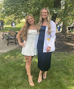 Sisters Lily Bertarelli and Isabella Bertarelli pose.