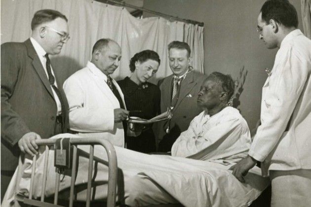 r. Louis T. Wright, second from left, and colleagues at a patient’s bedside in Harlem Hospital