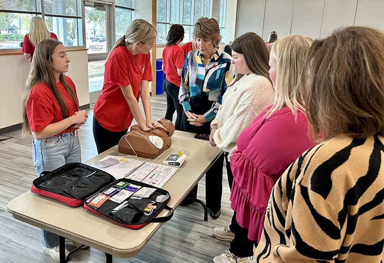 Members of the Missouri C.A.R.E.S. “Heart Squad” and Alpha Phi sorority offered hands-only CPR training at the latest C.A.R.E.S. community event to raise awareness of sudden cardiac arrest.