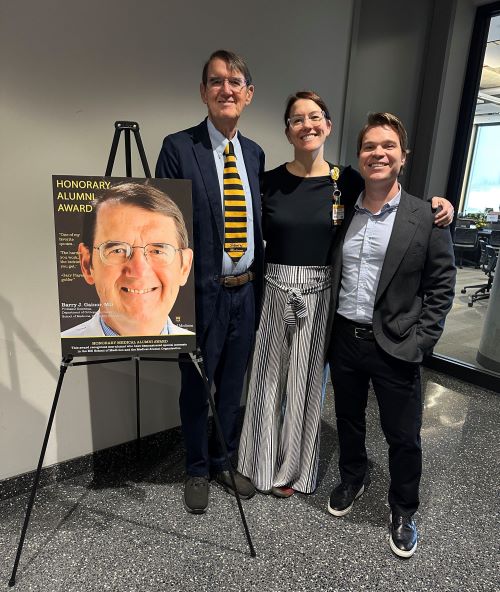 Dr. Gainor with his daughter and son-in-law