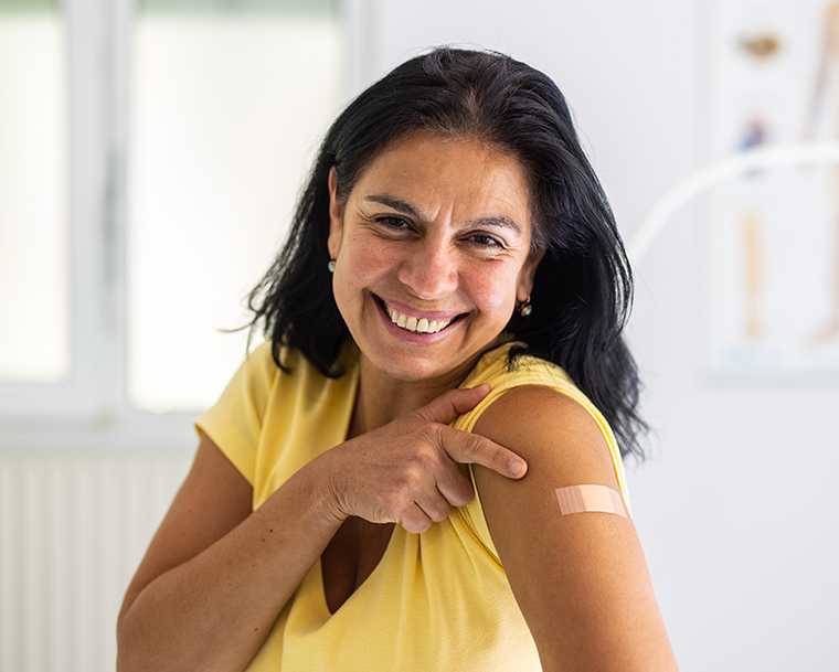 woman happy with immunization