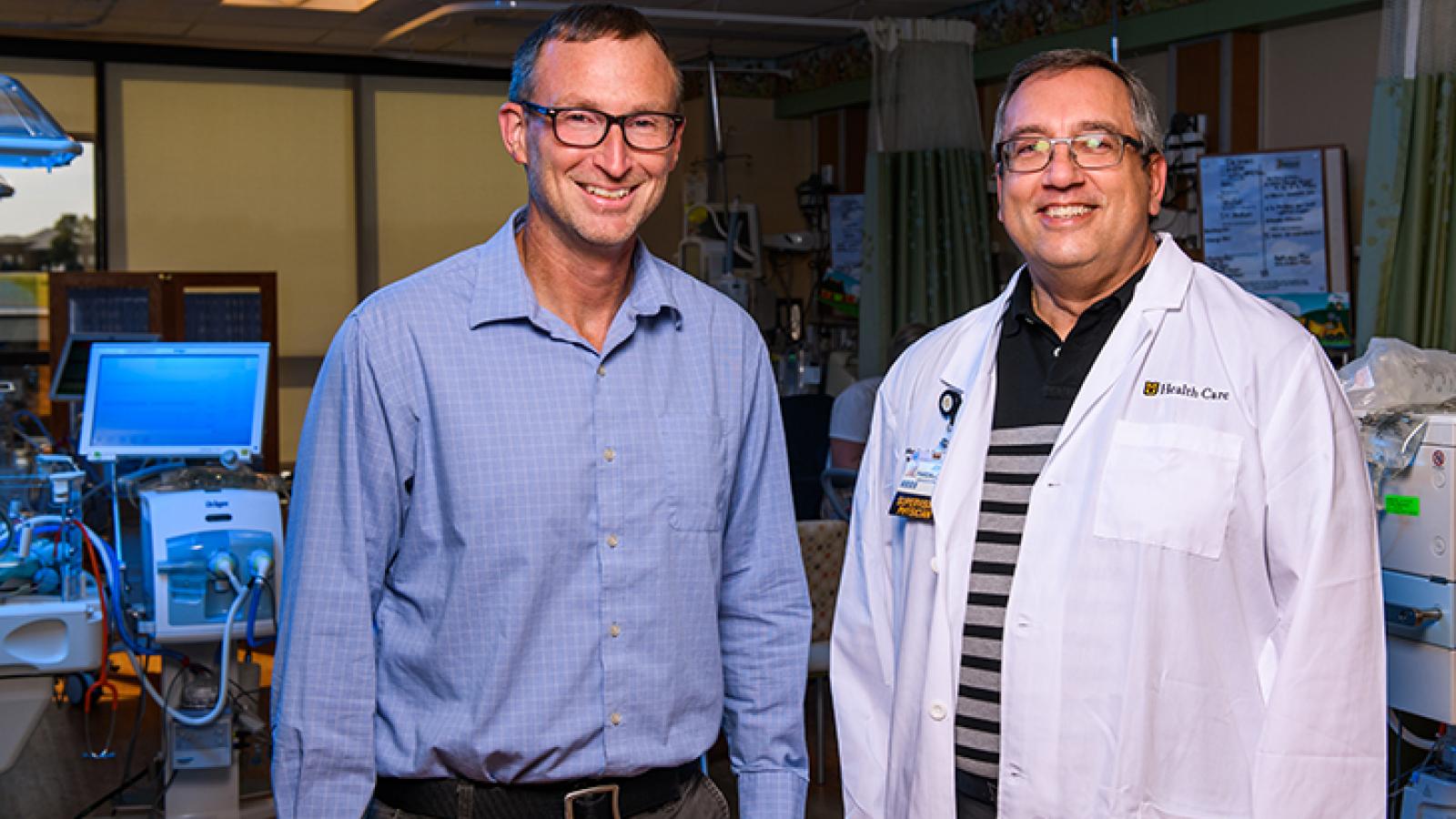 Photo of Dr. Fales and Dr. Pardalos