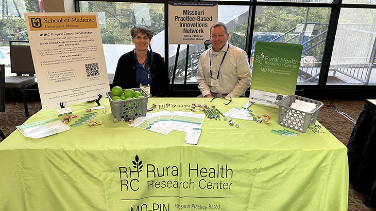 Jane McElroy and Kevin Everett RHRC booth
