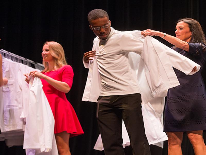 Members of the MU School of Medicine Class of 2021 receive their white coats during their White Coat Ceremony at Jesse Hall.