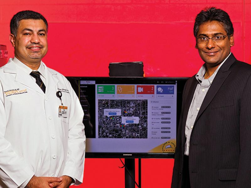 Salman Ahmad, MD, and Prasad Calyam, PhD, receive their Coulter award.