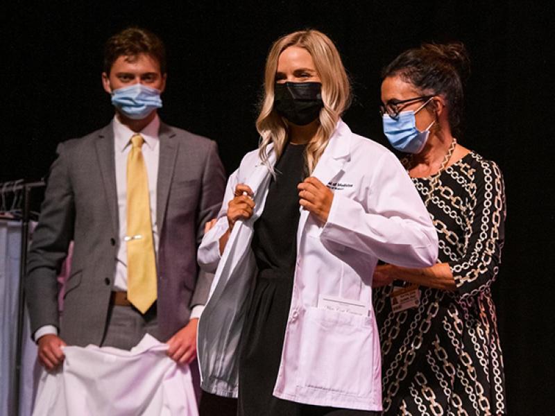 Brooke Burton receives her white coat