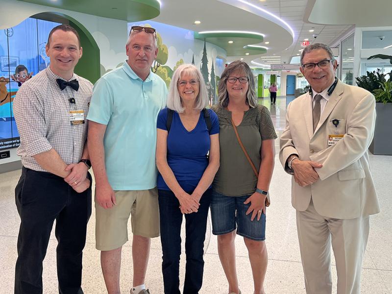 Tyler Severance, a pediatric hematology/oncology doctor with Mizzou’s School of Medicine; Steve Zentz; Pamela Zentz-Westover; Mellany Zentz-Mercer; and Richard Barohn, executive vice chancellor for health affairs and dean of the School of Medicine.