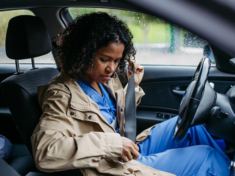 nurse in car