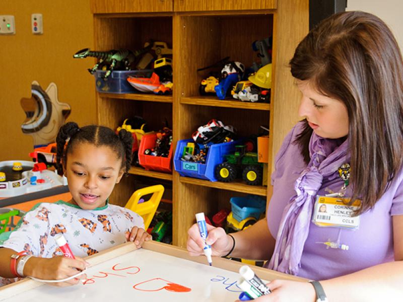 Therapist with child patient