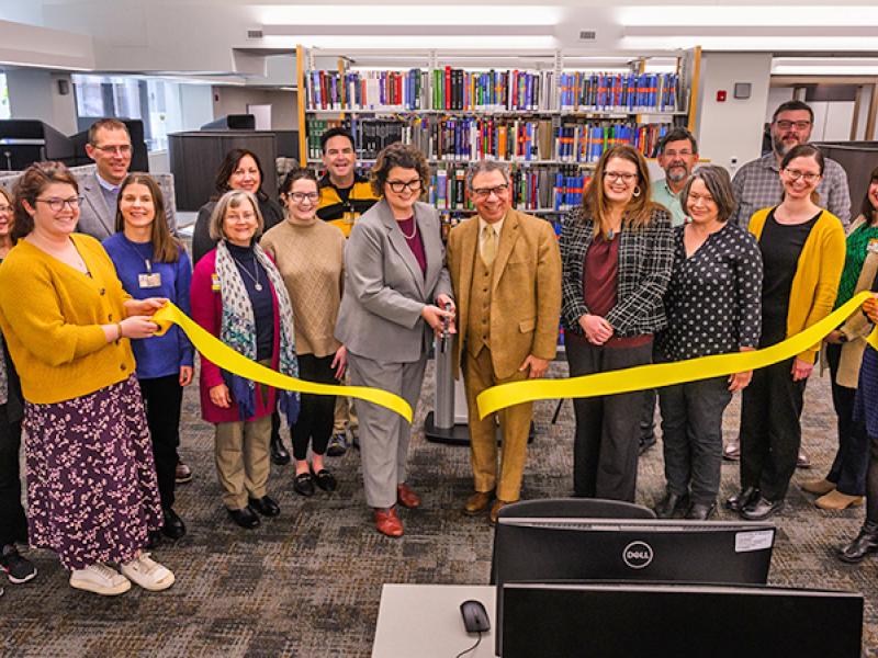 A reopening ceremony ribbon cutting