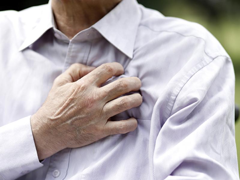 man having chest pain